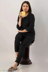 Women's black rayon short kurta and pyjama pant set with printed pattern for nightwear, available in various sizes from S to XXXL. Made in India